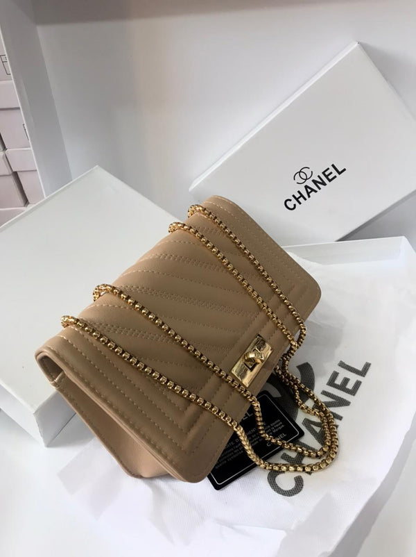 CHANEL Lambskin Chevron Quilted Boy Wallet On Chain Handbag